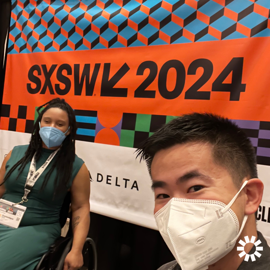 Justin Tsang, a person with short dark hair, and Domonique Howell, a light-skinned person wearing a green dress and using a wheelchair, pose for a photo in front of a large, patterned sign that reads, “SXSW 2024.” They are both wearing masks. The Kelsey logo is visible in the lower right corner.