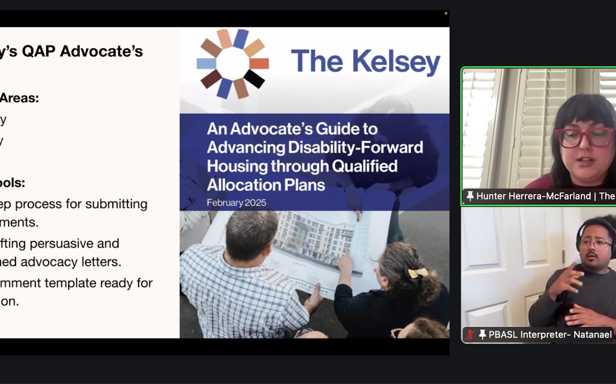 A screenshot of a Zoom presentation. A slide is shown next to two video call participants, one presenting and one ASL interpreter. The slide is titled, “The Kelsey’s QAP Advocate’s Guide.” The slide lists “Core Focus Areas” – Accessibility, Affordability, Inclusivity– then “Advocacy Tools” – Step-by-step process for submitting public comments; Tips for crafting persuasive and data-informed advocacy letters; A public comment template ready for customization. To the right of the text is the cover of The Kelsey’s guide titled, “An Advocate’s Guide to Advancing Disability-Forward Housing through Qualified Allocation Plans.”