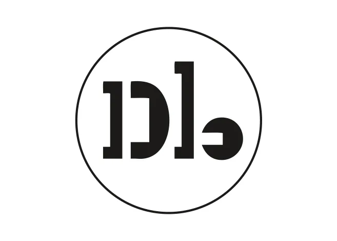 David Baker Architects logo. A black circular outline containing the letters ‘DB’ in a bold, modern font on a white background.