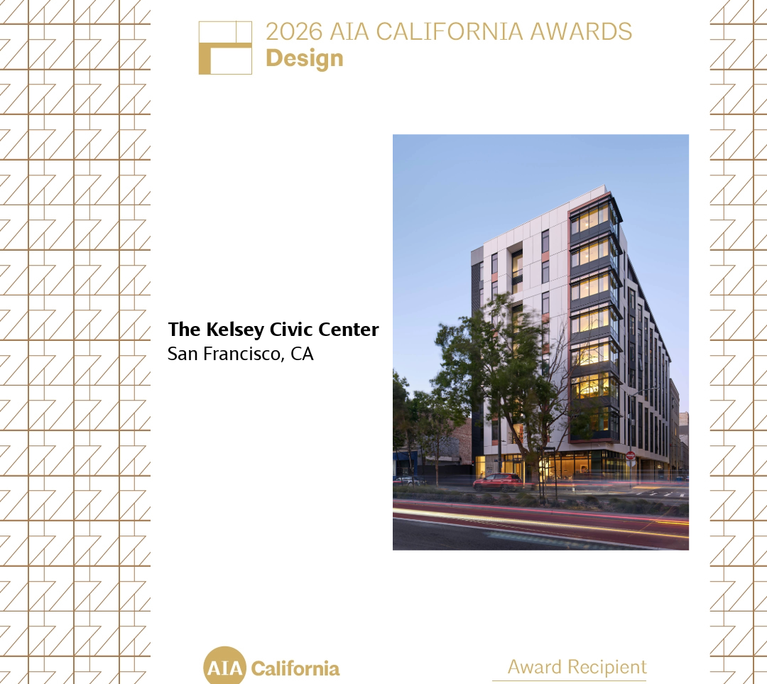 A square graphic on a white background framed by gold geometric line patterns on the left and right borders. At the top left, gold text reads '2026 AIA California Awards Design'. Below this, bold black text reads 'The Kelsey Civic Center, San Francisco, CA'. To the right is a vertical photograph of The Kelsey Civic Center at dusk: a modern, multi-story building with a white-paneled facade, black accent panels, and large windows. Street lights are artistically streaked at the bottom of the photograph. The bottom of the graphic features the gold 'AIA California' logo on the left and the underlined gold text 'Award Recipient' on the right."